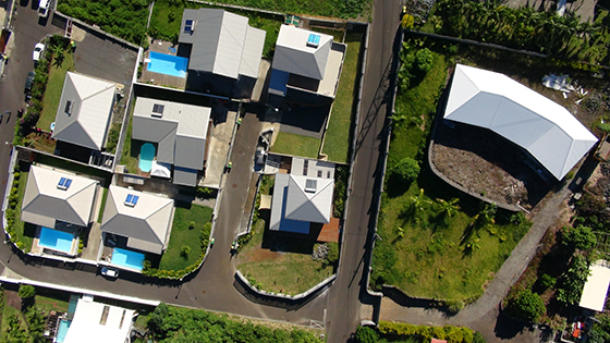 Building site or work inspections, real-estate promotion, videoclips, TV shows. Ortho-photo for architects, project managers, building permit, land registry with Drone Tech. Reunion Island.